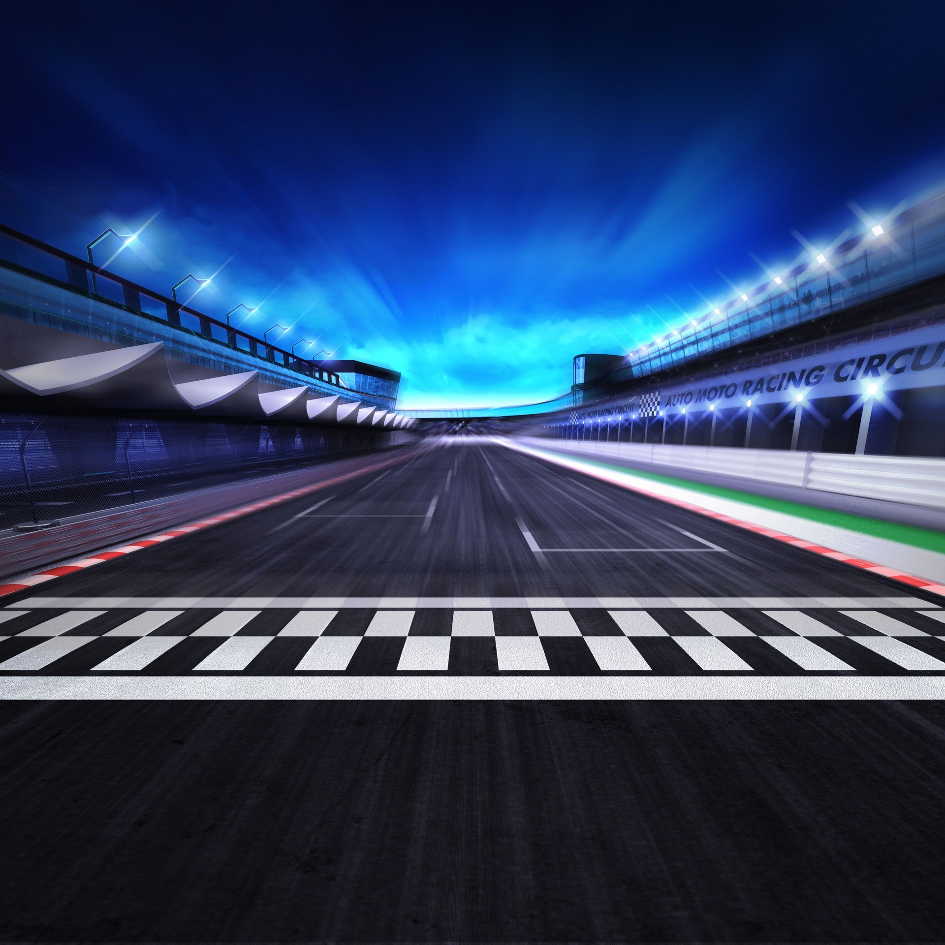 finish line on the racetrack in motion blur with stadium and spotlights
